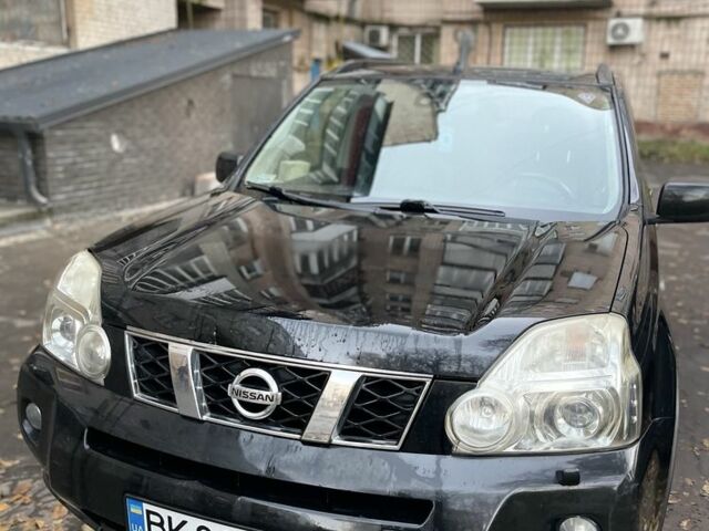 Чорний Ніссан ІксТрейл, об'ємом двигуна 2 л та пробігом 305 тис. км за 4299 $, фото 2 на Automoto.ua