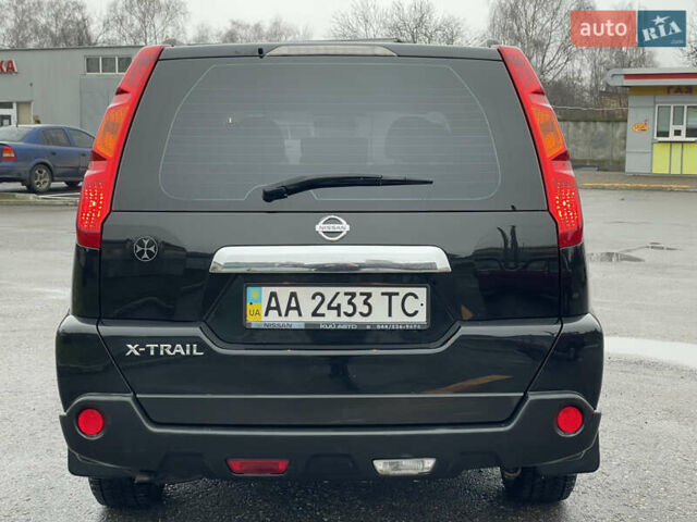 Черный Ниссан ИксТрейл, объемом двигателя 2 л и пробегом 210 тыс. км за 8750 $, фото 9 на Automoto.ua