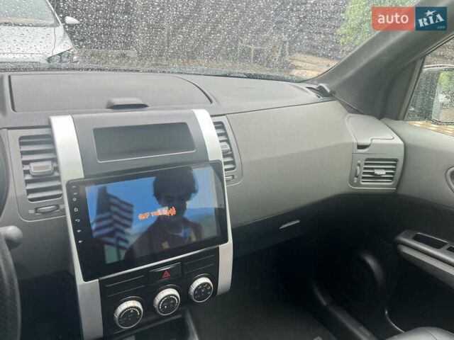 Черный Ниссан ИксТрейл, объемом двигателя 2 л и пробегом 175 тыс. км за 11500 $, фото 11 на Automoto.ua