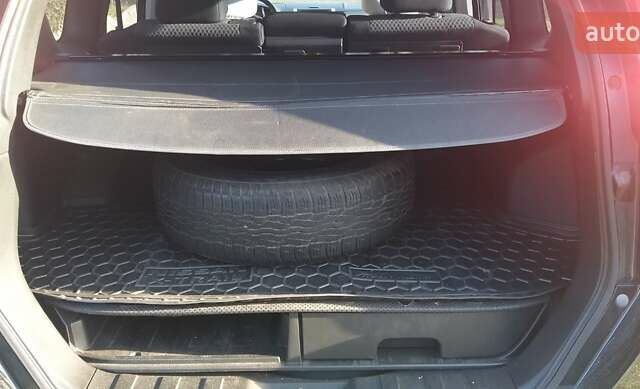 Черный Ниссан ИксТрейл, объемом двигателя 2 л и пробегом 182 тыс. км за 9300 $, фото 4 на Automoto.ua