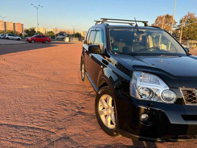 Чорний Ніссан ІксТрейл, об'ємом двигуна 2.5 л та пробігом 223 тис. км за 9172 $, фото 4 на Automoto.ua