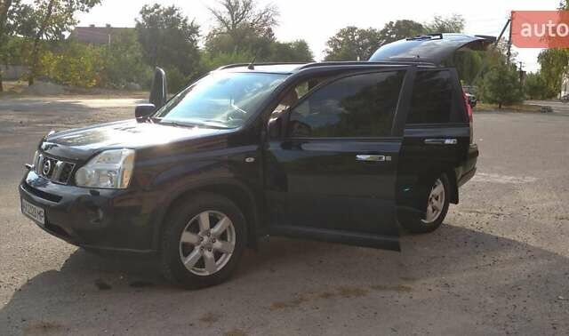 Черный Ниссан ИксТрейл, объемом двигателя 2 л и пробегом 240 тыс. км за 9700 $, фото 18 на Automoto.ua