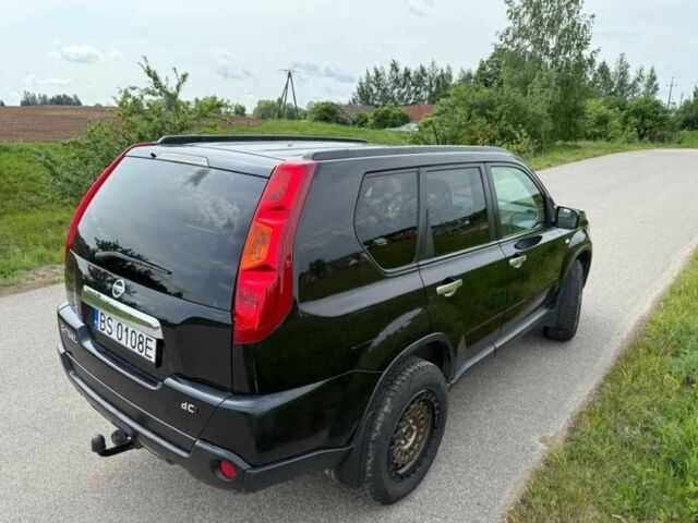 Черный Ниссан ИксТрейл, объемом двигателя 2 л и пробегом 345 тыс. км за 2650 $, фото 4 на Automoto.ua