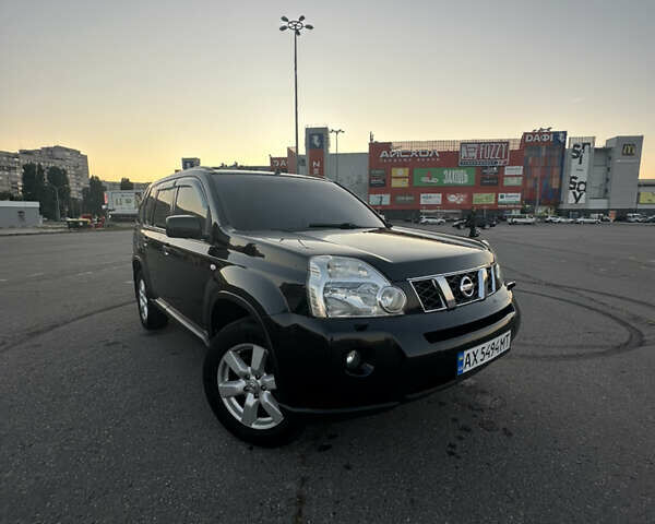 Черный Ниссан ИксТрейл, объемом двигателя 2 л и пробегом 305 тыс. км за 10700 $, фото 6 на Automoto.ua