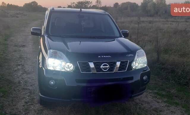 Черный Ниссан ИксТрейл, объемом двигателя 2 л и пробегом 182 тыс. км за 9300 $, фото 16 на Automoto.ua