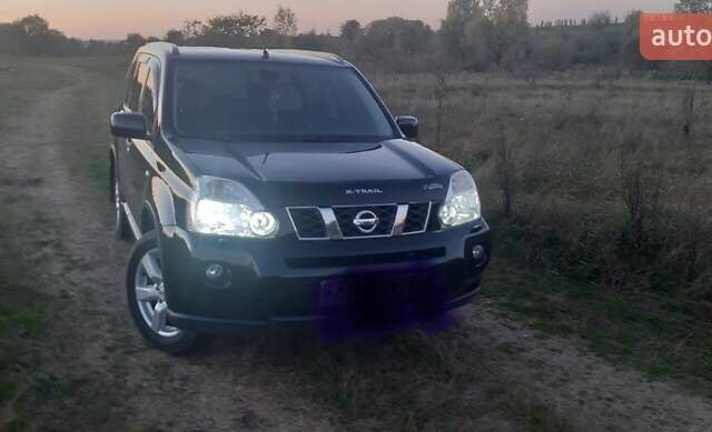 Черный Ниссан ИксТрейл, объемом двигателя 2 л и пробегом 182 тыс. км за 9300 $, фото 23 на Automoto.ua