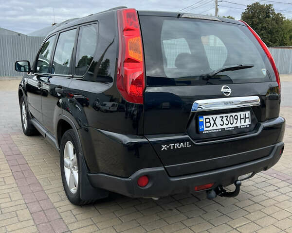 Чорний Ніссан ІксТрейл, об'ємом двигуна 2 л та пробігом 246 тис. км за 7800 $, фото 5 на Automoto.ua