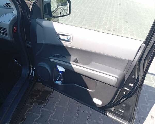 Черный Ниссан ИксТрейл, объемом двигателя 2 л и пробегом 192 тыс. км за 9500 $, фото 6 на Automoto.ua