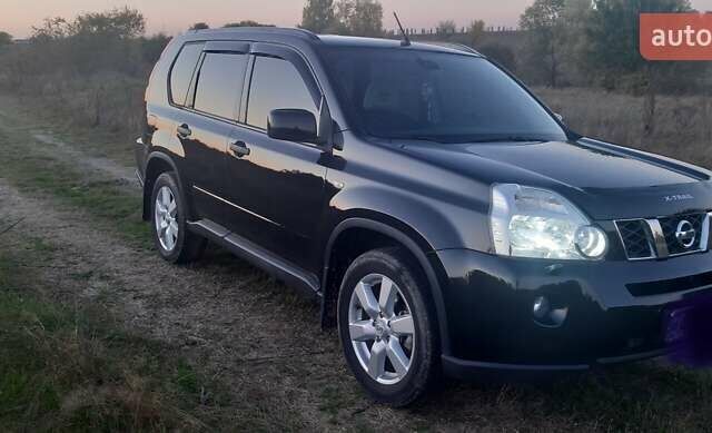 Черный Ниссан ИксТрейл, объемом двигателя 2 л и пробегом 182 тыс. км за 9300 $, фото 20 на Automoto.ua