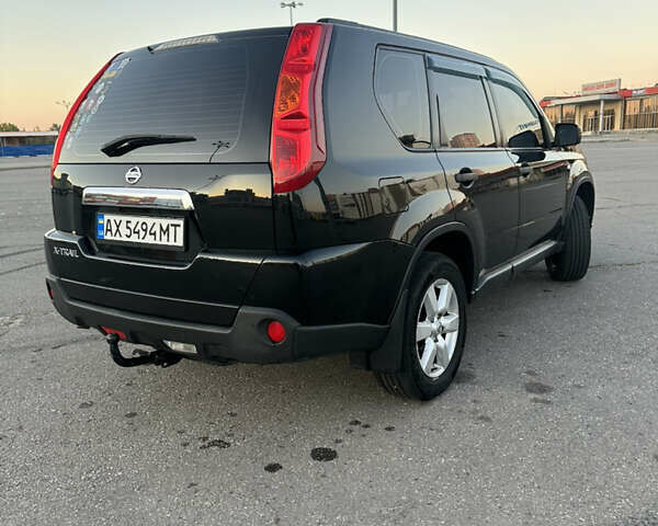 Черный Ниссан ИксТрейл, объемом двигателя 2 л и пробегом 305 тыс. км за 10700 $, фото 5 на Automoto.ua