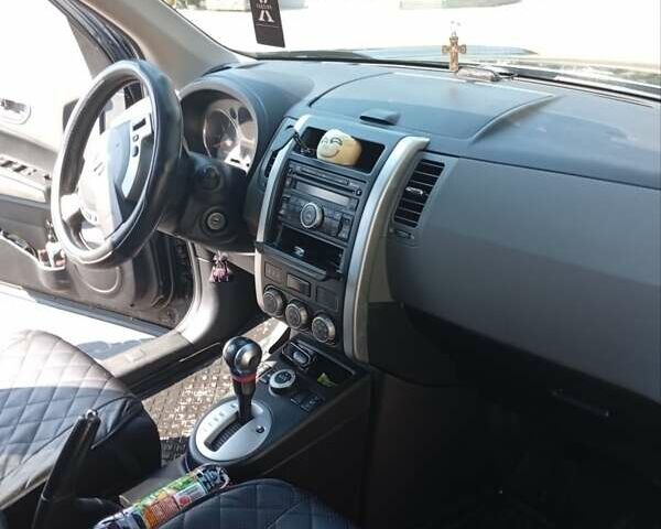 Черный Ниссан ИксТрейл, объемом двигателя 2 л и пробегом 192 тыс. км за 9500 $, фото 10 на Automoto.ua