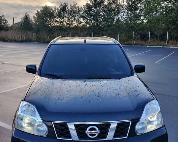 Черный Ниссан ИксТрейл, объемом двигателя 2 л и пробегом 284 тыс. км за 8500 $, фото 2 на Automoto.ua