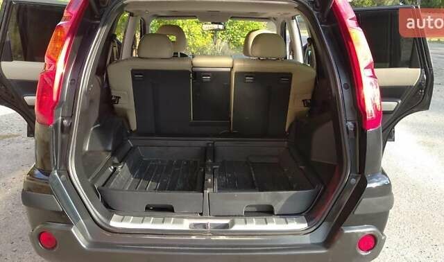 Черный Ниссан ИксТрейл, объемом двигателя 2 л и пробегом 240 тыс. км за 9700 $, фото 14 на Automoto.ua