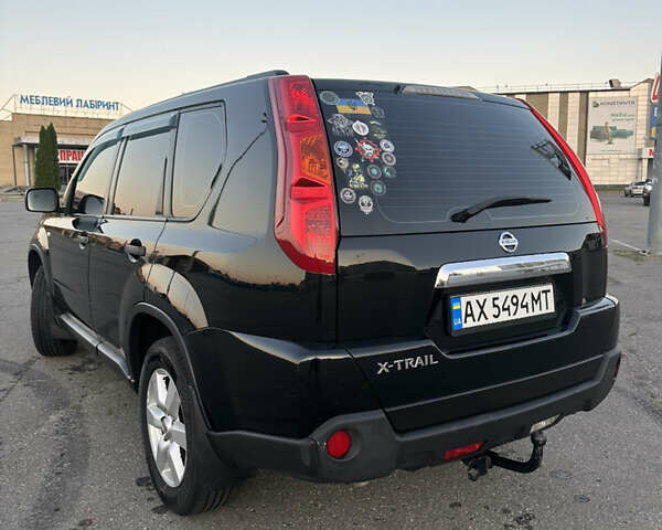 Черный Ниссан ИксТрейл, объемом двигателя 2 л и пробегом 305 тыс. км за 10700 $, фото 8 на Automoto.ua