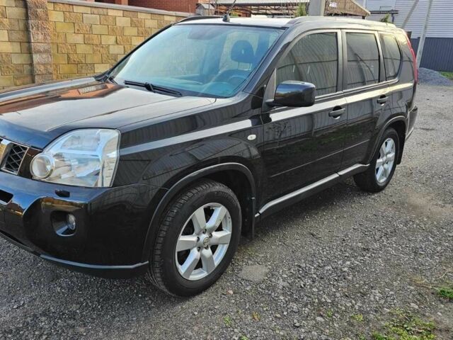 Черный Ниссан ИксТрейл, объемом двигателя 2 л и пробегом 230 тыс. км за 9000 $, фото 4 на Automoto.ua