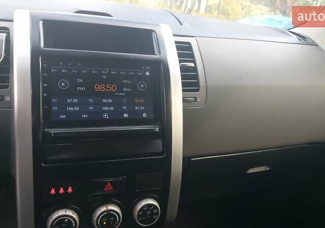 Черный Ниссан ИксТрейл, объемом двигателя 2 л и пробегом 182 тыс. км за 9300 $, фото 12 на Automoto.ua