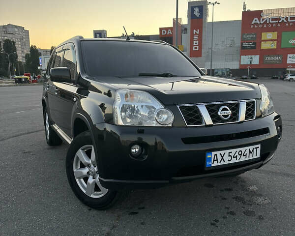 Черный Ниссан ИксТрейл, объемом двигателя 2 л и пробегом 305 тыс. км за 10700 $, фото 7 на Automoto.ua