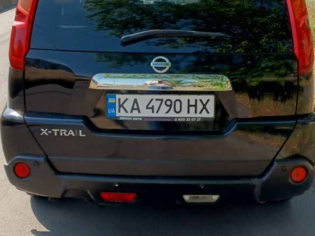 Чорний Ніссан ІксТрейл, об'ємом двигуна 2.5 л та пробігом 170 тис. км за 11000 $, фото 3 на Automoto.ua