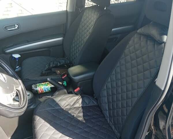 Черный Ниссан ИксТрейл, объемом двигателя 2 л и пробегом 192 тыс. км за 9500 $, фото 1 на Automoto.ua