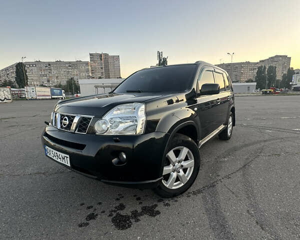 Черный Ниссан ИксТрейл, объемом двигателя 2 л и пробегом 305 тыс. км за 10700 $, фото 12 на Automoto.ua