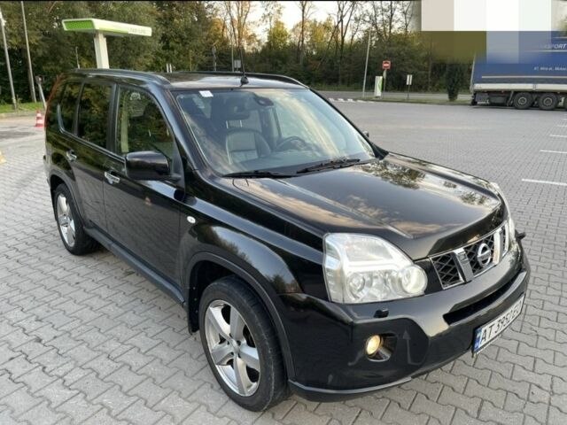 Черный Ниссан ИксТрейл, объемом двигателя 2 л и пробегом 242 тыс. км за 9300 $, фото 4 на Automoto.ua