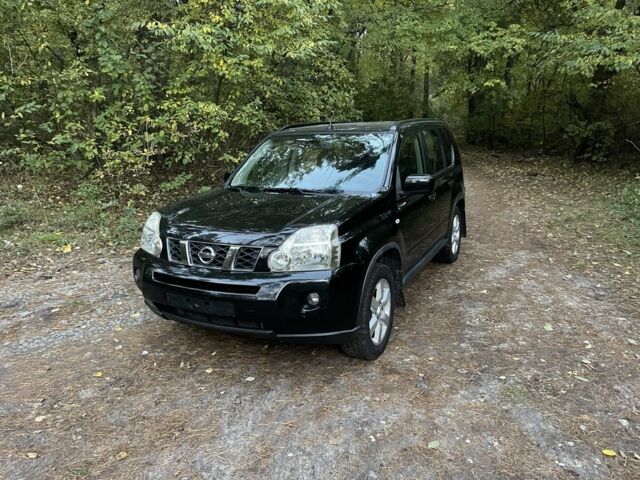 Черный Ниссан ИксТрейл, объемом двигателя 2.2 л и пробегом 200 тыс. км за 5800 $, фото 2 на Automoto.ua