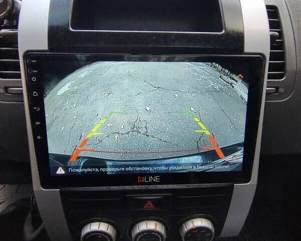 Черный Ниссан ИксТрейл, объемом двигателя 25 л и пробегом 213 тыс. км за 9725 $, фото 6 на Automoto.ua