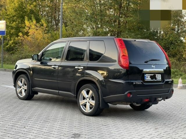 Черный Ниссан ИксТрейл, объемом двигателя 2 л и пробегом 244 тыс. км за 8298 $, фото 3 на Automoto.ua