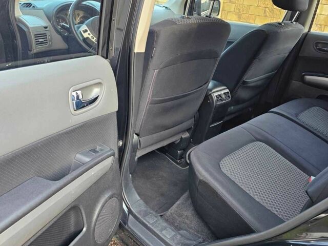 Черный Ниссан ИксТрейл, объемом двигателя 2 л и пробегом 230 тыс. км за 9000 $, фото 7 на Automoto.ua