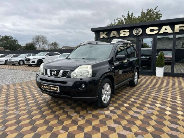 Черный Ниссан ИксТрейл, объемом двигателя 2 л и пробегом 148 тыс. км за 10750 $, фото 1 на Automoto.ua