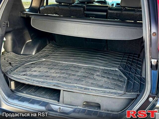 Черный Ниссан ИксТрейл, объемом двигателя 2 л и пробегом 227 тыс. км за 8300 $, фото 6 на Automoto.ua