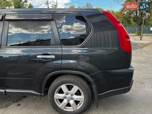 Черный Ниссан ИксТрейл, объемом двигателя 2.5 л и пробегом 166 тыс. км за 8680 $, фото 10 на Automoto.ua