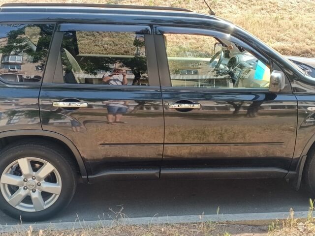 Чорний Ніссан ІксТрейл, об'ємом двигуна 2.5 л та пробігом 170 тис. км за 11000 $, фото 4 на Automoto.ua