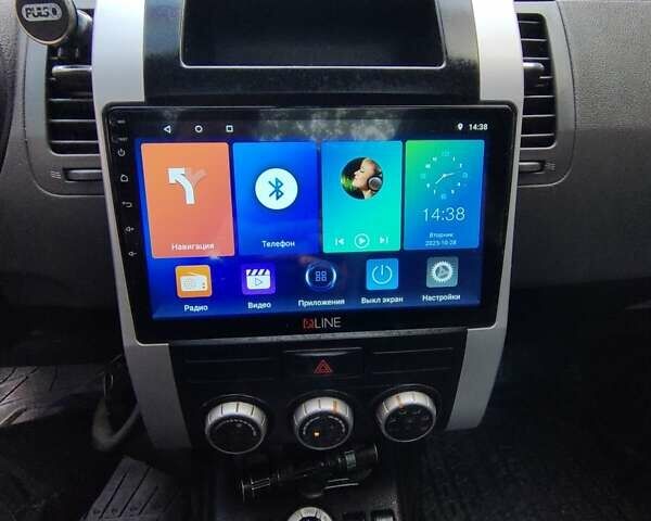 Черный Ниссан ИксТрейл, объемом двигателя 25 л и пробегом 213 тыс. км за 9725 $, фото 2 на Automoto.ua