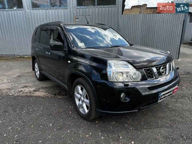 Черный Ниссан ИксТрейл, объемом двигателя 2.5 л и пробегом 166 тыс. км за 8680 $, фото 2 на Automoto.ua