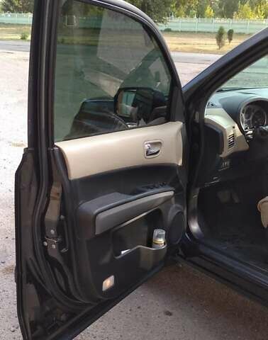 Черный Ниссан ИксТрейл, объемом двигателя 2 л и пробегом 240 тыс. км за 9700 $, фото 13 на Automoto.ua