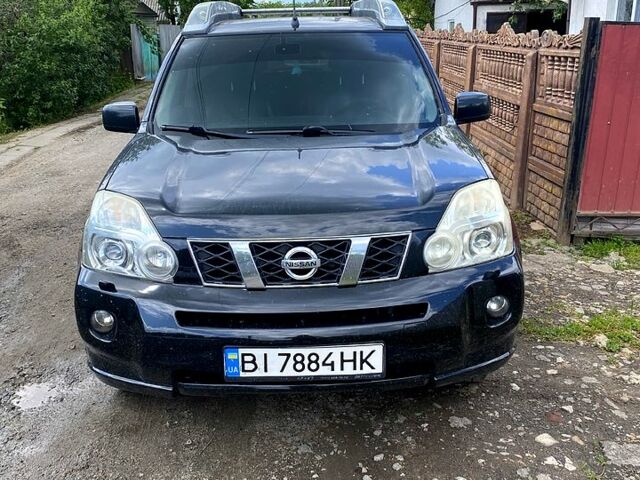 Черный Ниссан ИксТрейл, объемом двигателя 2.5 л и пробегом 280 тыс. км за 7500 $, фото 1 на Automoto.ua