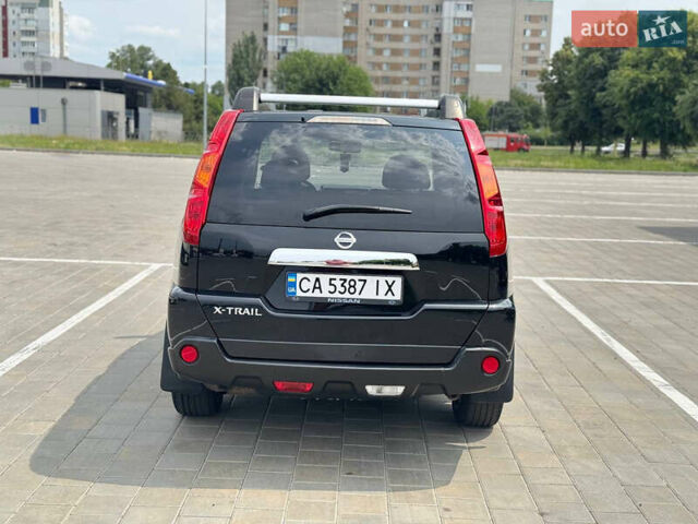 Чорний Ніссан ІксТрейл, об'ємом двигуна 2 л та пробігом 165 тис. км за 9200 $, фото 5 на Automoto.ua