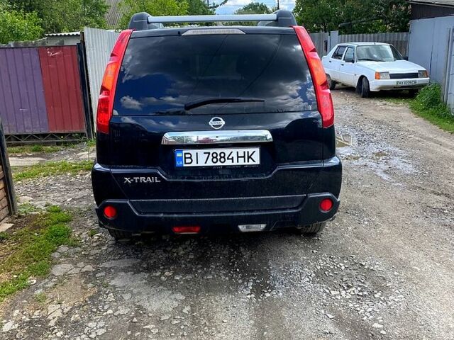 Черный Ниссан ИксТрейл, объемом двигателя 2.5 л и пробегом 280 тыс. км за 7500 $, фото 2 на Automoto.ua