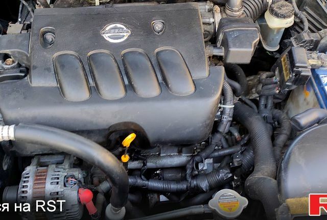 Черный Ниссан ИксТрейл, объемом двигателя 2 л и пробегом 205 тыс. км за 7800 $, фото 4 на Automoto.ua