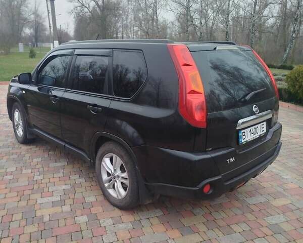 Черный Ниссан ИксТрейл, объемом двигателя 2 л и пробегом 262 тыс. км за 8950 $, фото 2 на Automoto.ua
