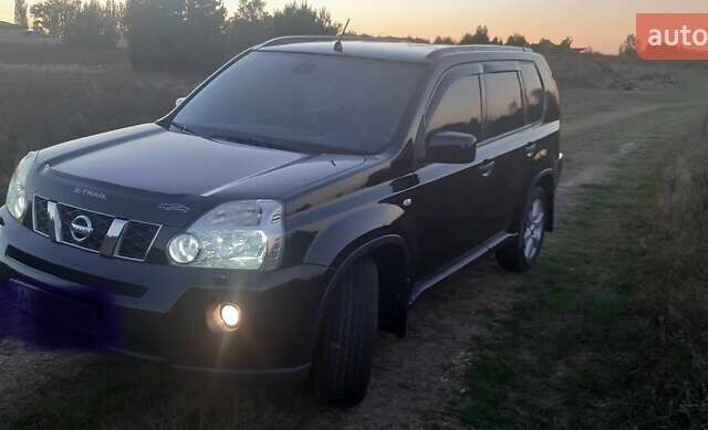 Черный Ниссан ИксТрейл, объемом двигателя 2 л и пробегом 182 тыс. км за 9300 $, фото 24 на Automoto.ua