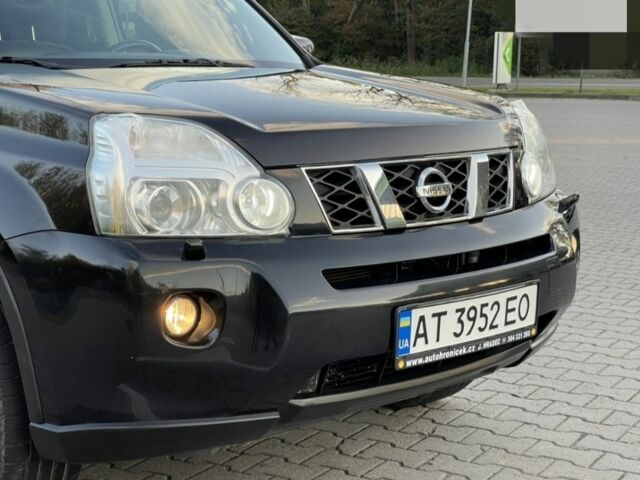 Черный Ниссан ИксТрейл, объемом двигателя 2 л и пробегом 242 тыс. км за 9300 $, фото 7 на Automoto.ua