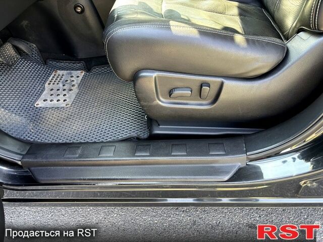 Черный Ниссан ИксТрейл, объемом двигателя 2.5 л и пробегом 199 тыс. км за 8800 $, фото 4 на Automoto.ua