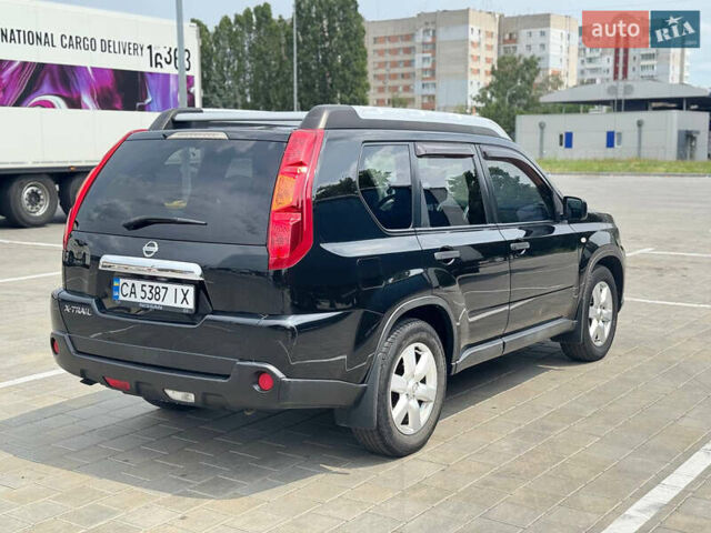 Чорний Ніссан ІксТрейл, об'ємом двигуна 2 л та пробігом 165 тис. км за 9200 $, фото 2 на Automoto.ua