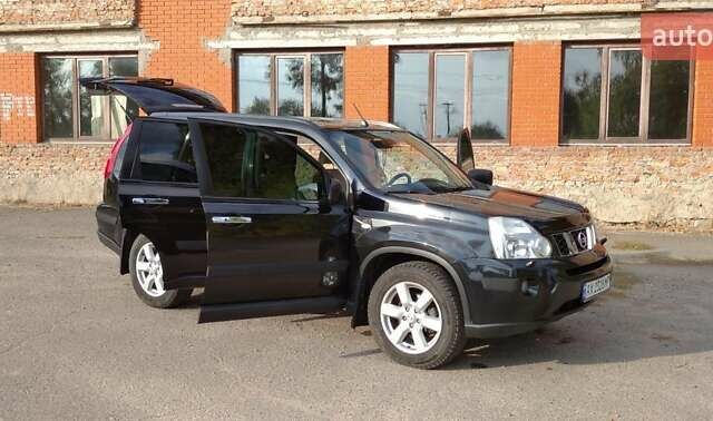 Черный Ниссан ИксТрейл, объемом двигателя 2 л и пробегом 240 тыс. км за 9700 $, фото 16 на Automoto.ua