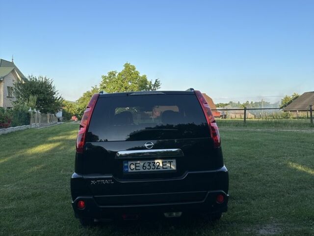 Чорний Ніссан ІксТрейл, об'ємом двигуна 2.5 л та пробігом 238 тис. км за 9500 $, фото 2 на Automoto.ua