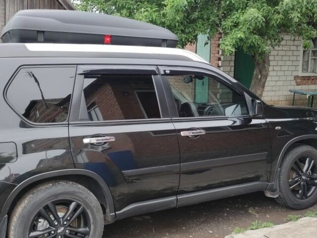 Чорний Ніссан ІксТрейл, об'ємом двигуна 2 л та пробігом 205 тис. км за 7700 $, фото 3 на Automoto.ua
