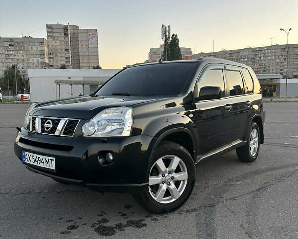 Черный Ниссан ИксТрейл, объемом двигателя 2 л и пробегом 305 тыс. км за 10700 $, фото 11 на Automoto.ua