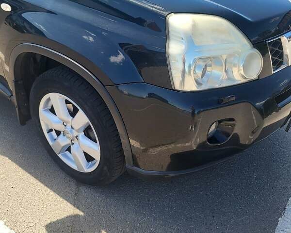 Чорний Ніссан ІксТрейл, об'ємом двигуна 2.49 л та пробігом 240 тис. км за 8700 $, фото 9 на Automoto.ua